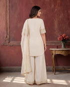 Elegant Cream Gold-Zari Work Straight Kurti and Wide-Leg Palazzo Suit
